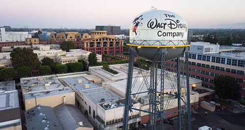  multiple electronic devices displaying Disney products