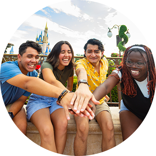 A group of friends stacking hands